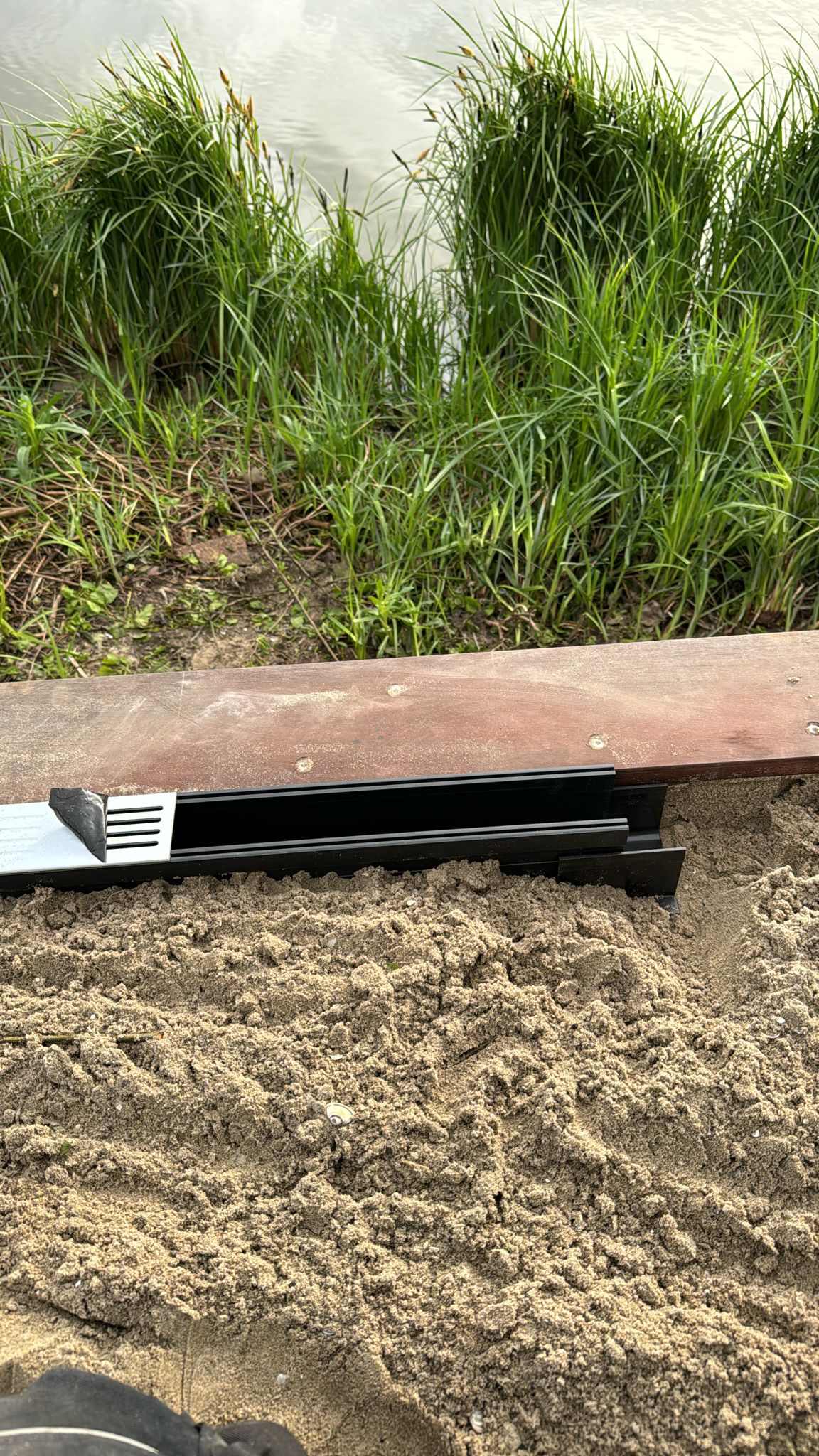 hoe leg je een watergoot voor het terras of tuin het beste aan